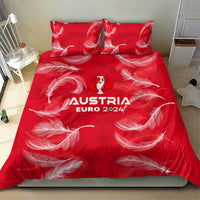 Red bedding set: duvet cover with AUSTRIA EURO 2024 logo and white feather motifs, 2 pillows