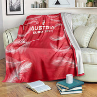 Red Austria Euro 2024 blanket with white feather graphics and trophy wing logo