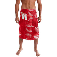 Red sarong-style wrap skirt with white feather wings and “YOUR NAME 00” on front