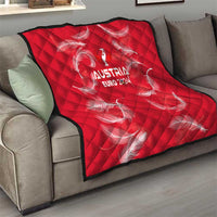 Red quilt blanket with diamond pattern and Austria Euro 2024 trophy graphic