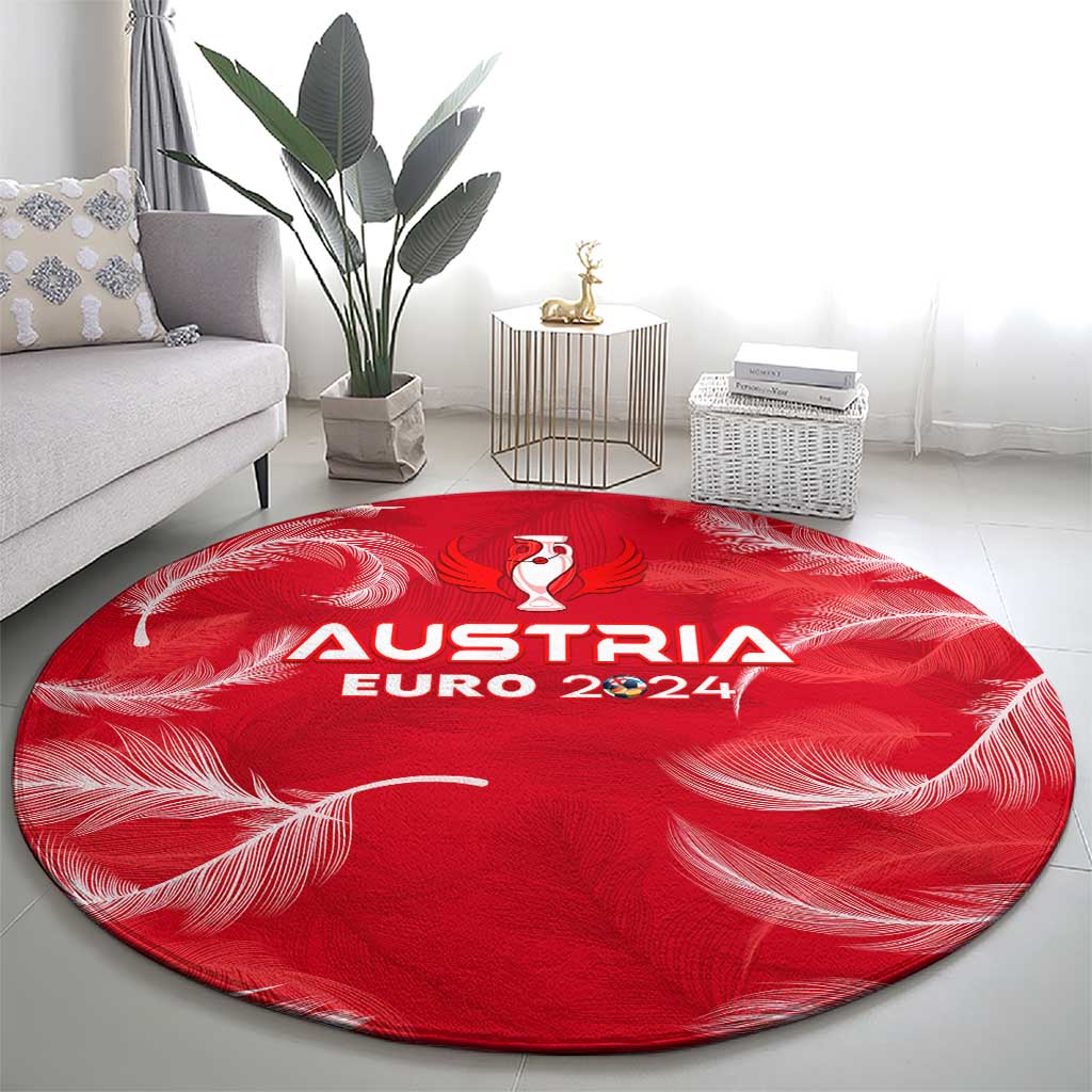 Red round carpet featuring Austria Euro 2024 logo with trophy above text