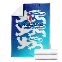 England football blanket folded, blue/teal gradient with white lion crest and 'EURO 2024'