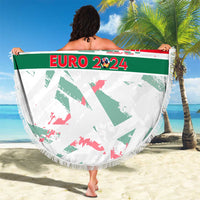 Round beach blanket with Euro 2024 text, green wing stripes, and fringed edge