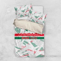 Hungary Euro 2024 bedding set flat lay, white duvet with green/red wing print and two pillows