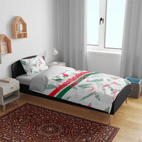 Hungary Euro 2024 bedding set on bedroom bed, white duvet with green/red wing print and pillows