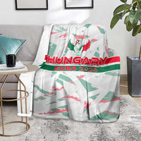 White Hungary Euro 2024 blanket laid on floor, red "HUNGARY" and crest graphic
