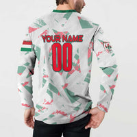 White button sweatshirt with green collar, YOUR NAME and 00 number graphic on back