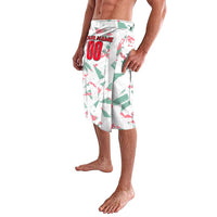 Personalized football graphic shorts in white with green and red geometric print, side view