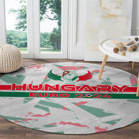 Round rug featuring Hungary Euro 2024 emblem, red and green lettering on gray.