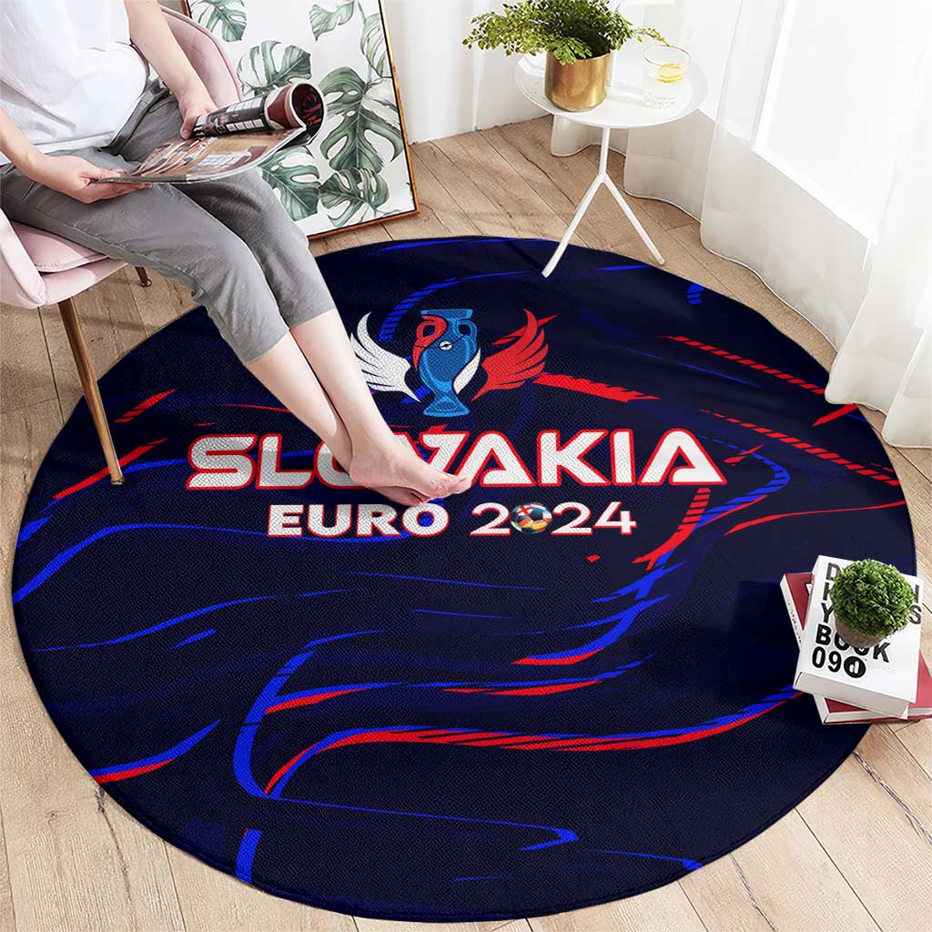 Blue round carpet with centered SLOVAKIA EURO 2024 text and wing emblem