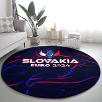Blue round carpet with SLOVAKIA EURO 2024 text and red-blue wing strokes