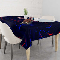 Blue football tablecloth draped on dining table with red and blue abstract graphics