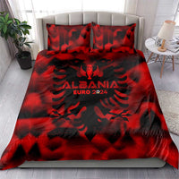 Red duvet cover and pillowcases with Albania Euro 2024 emblem in dark abstract pattern