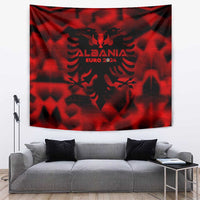 Hanging red tapestry with black eagle crest and "EURO 2024" lettering