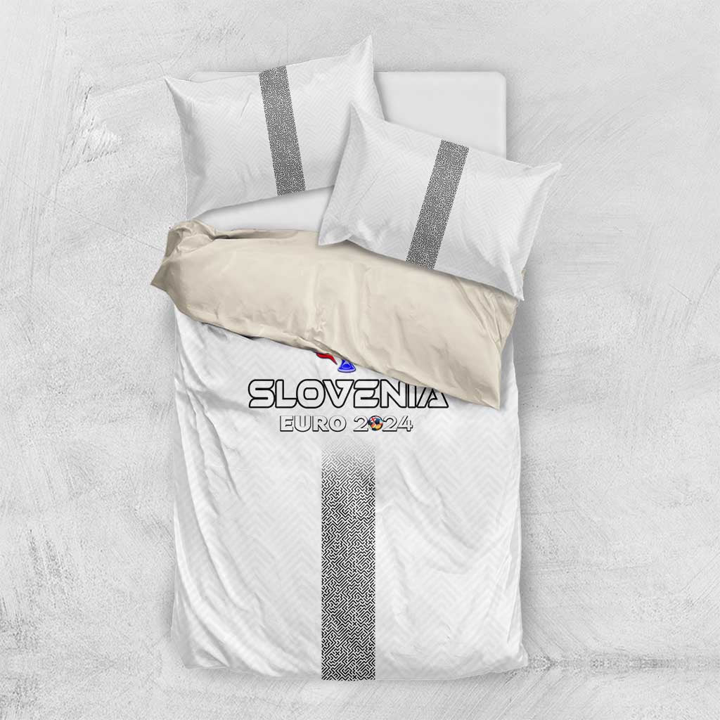 White duvet and pillows with grey stripe band and Slovenia EURO 2024 graphic emblem