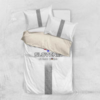 White duvet and pillows with grey stripe band and Slovenia EURO 2024 graphic emblem