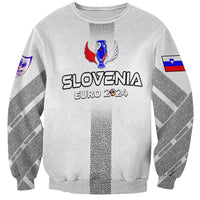 White sweatshirt with Slovenia Euro 2024 print, trophy wing emblem, and flag sleeve graphics