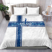 White duvet cover with blue cross stripes and Finland EURO 2024 emblem, set with two pillows