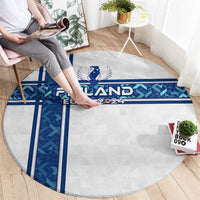 Round carpet with Finland Euro 2024 logo, blue stripes, and light textured center