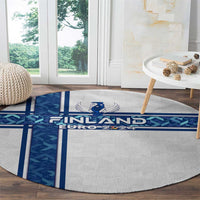 Round indoor rug with Finland Euro 2024 text and blue geometric stripe design