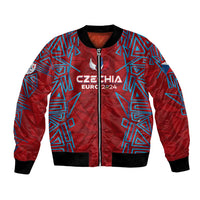 Red bomber jacket with blue geometric print, full-zip front, ribbed cuffs