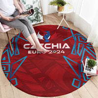 Red round rug with central Czechia Euro 2024 mascot graphic and blue pattern