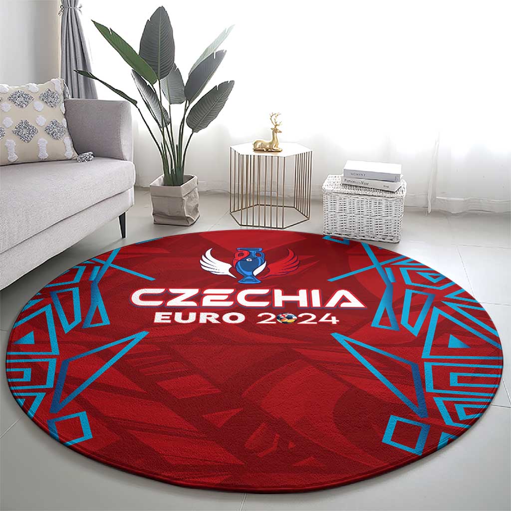 Red round rug with Czechia Euro 2024 logo and blue geometric pattern