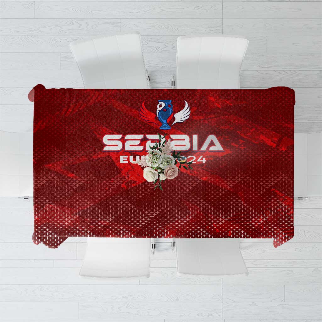 Red football-themed tablecloth with central crest logo and geometric pattern