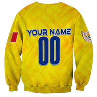 Yellow football sweatshirt with personalized name and large number 00 graphic