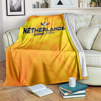 Yellow Netherlands Euro 2024 blanket with trophy wing print and light gray reverse