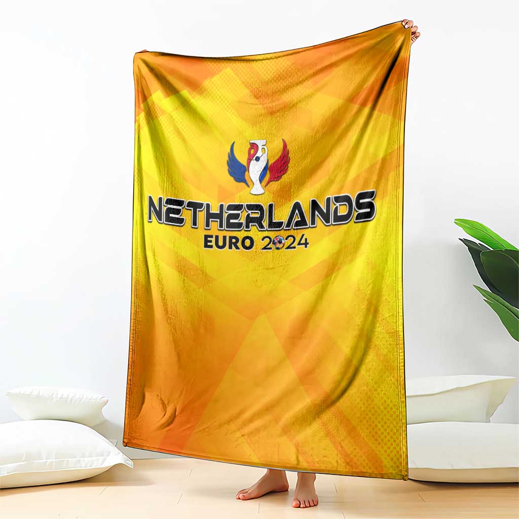Yellow Netherlands Euro 2024 blanket with trophy wing emblem and bold text