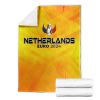 Yellow Netherlands Euro 2024 blanket with trophy wing design and bold text
