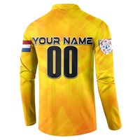 Yellow back button sweatshirt with 'YOUR NAME' and '00' number, crest sleeve patch