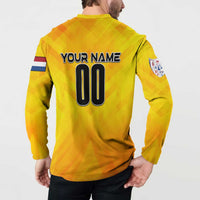Yellow back button sweatshirt with 'YOUR NAME' and '00' number, flag stripe sleeve