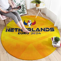 Yellow round rug with Netherlands Euro 2024 printed logo and trophy wing emblem