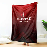 Red football blanket hanging upright, featuring trophy crest and TURKIYE EURO 2024 graphic