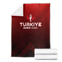 Red football blanket folded with white towels, trophy crest and TURKIYE EURO 2024 print