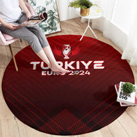 Red round Turkey Euro 2024 rug underfoot with white logo and text