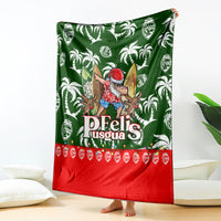 Green tropical Christmas blanket with white palm prints, Santa character, and red bottom panel
