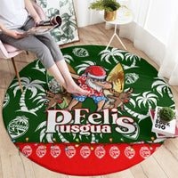 Round rug on floor with green tropical leaf pattern, red edge, Felis Pusgua artwork