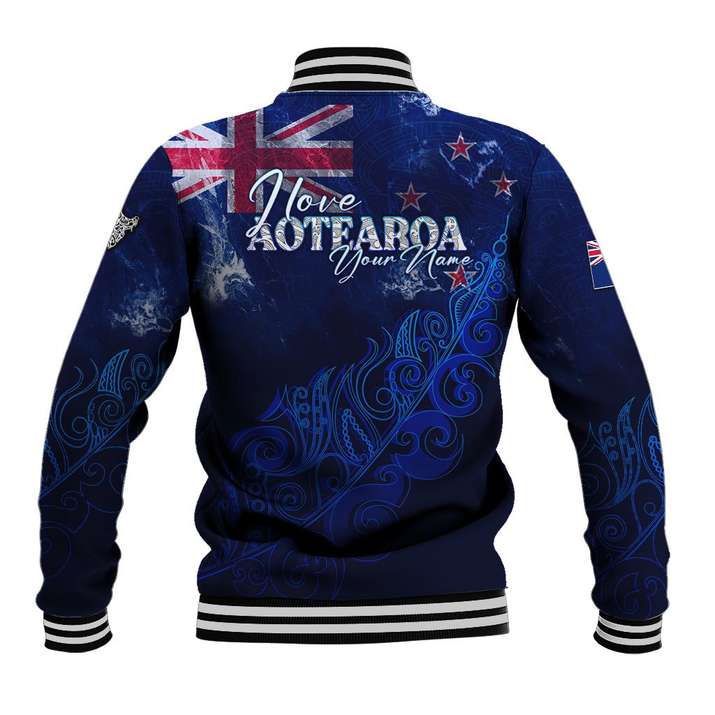 Blue personalized baseball jacket back graphic with I love AOTEAROA text and striped collar