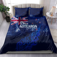 Personalised blue duvet and pillowcases with Love Aotearoa text, UK flag and fern motif