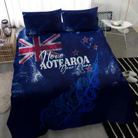 Personalised blue bedding set with Love Aotearoa graphic, stars and fern swirl motif