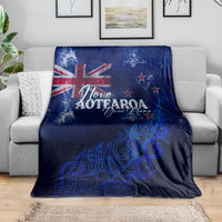 Blue personalized blanket featuring Aotearoa lettering, stars, and silver fern artwork