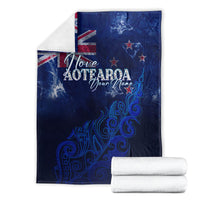Blue personalized blanket laid flat with Aotearoa text and silver fern motif