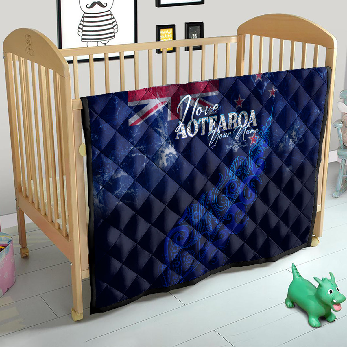 Blue quilt with Union Jack, 'Love Aotearoa' text, and New Zealand map/fern print