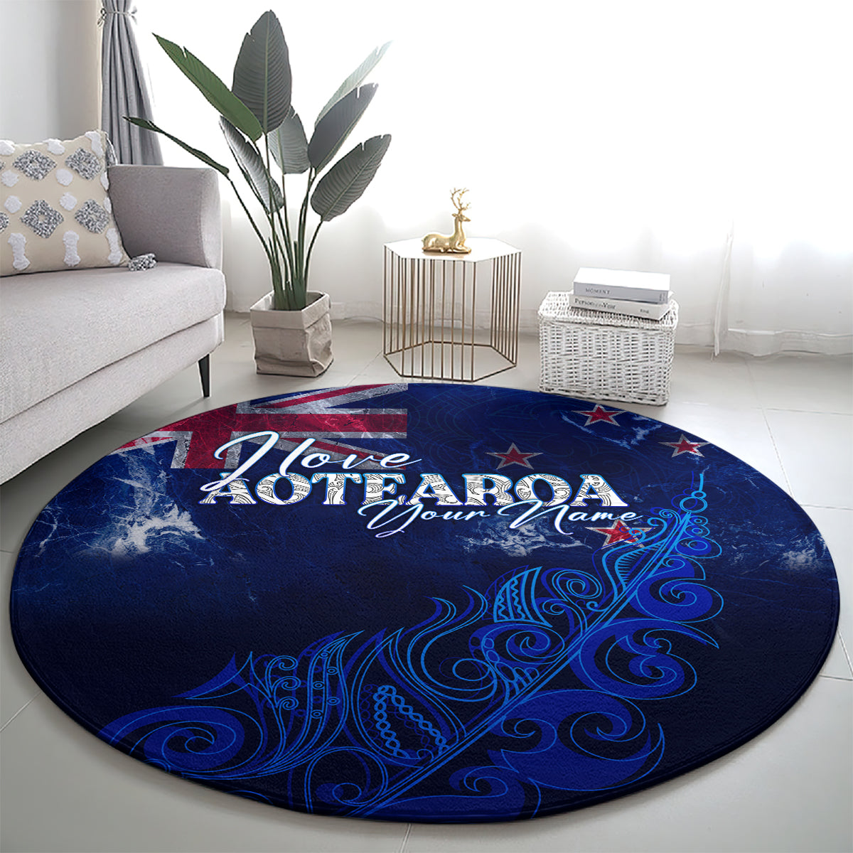 Round blue Aotearoa map rug featuring “I love AOTEAROA” and stylized fern swirls