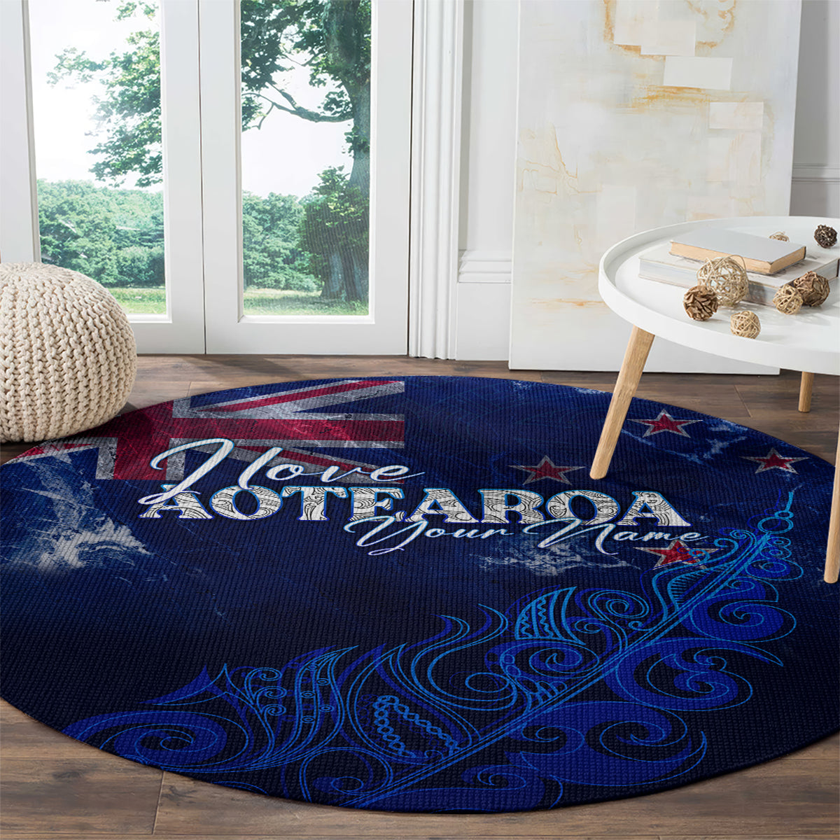 Round blue Aotearoa rug with “I love AOTEAROA” text and fern-themed swirl graphics