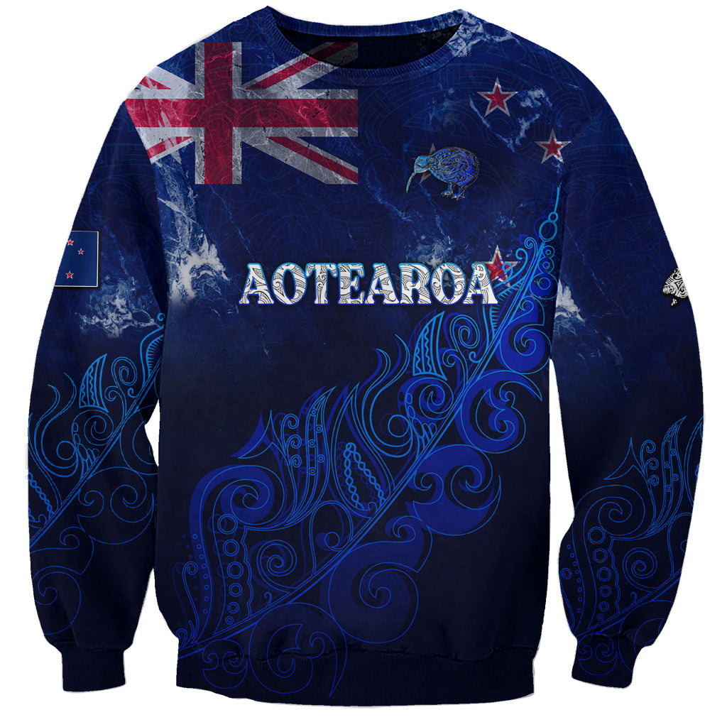 Unisex blue sweatshirt with AOTEAROA lettering and New Zealand map graphic