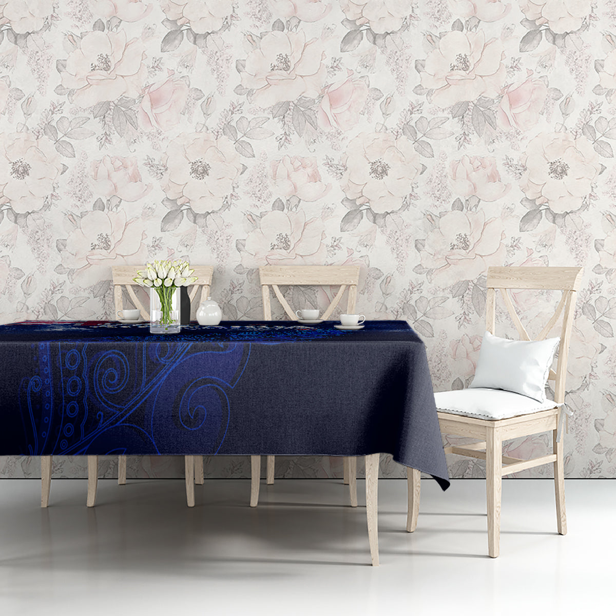 Blue New Zealand tablecloth with silver fern and Aotearoa map on dining set